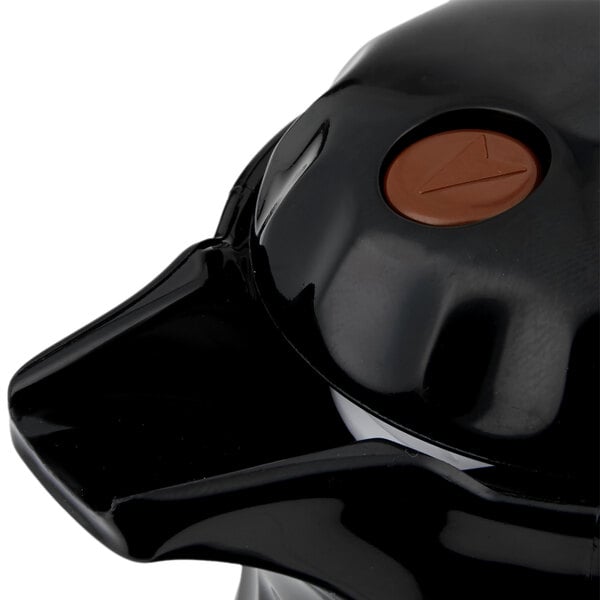 A close up of a black Vollrath SwirlServe coffee server.