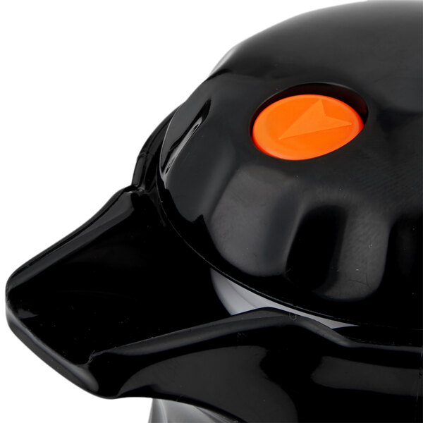 A black Vollrath SwirlServe hot-n-cold beverage server with an orange button on top.