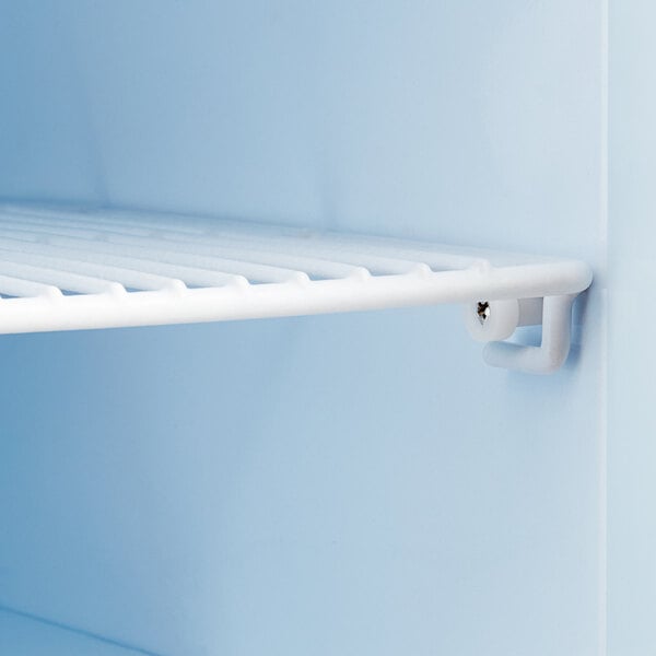 A white shelf with a handle in front of a white background.