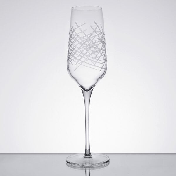 A Reserve by Libbey Crosshatch Champagne Flute with a thin stem and a design on it.