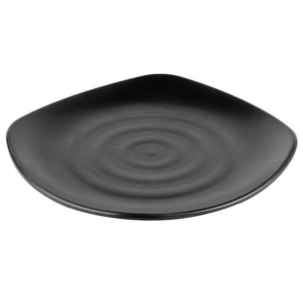 A black square plate with ripples.