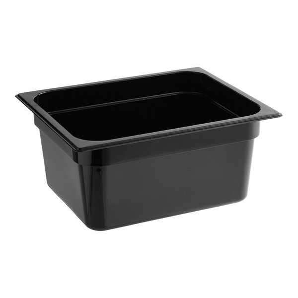 A Carlisle black polycarbonate food pan on a counter.