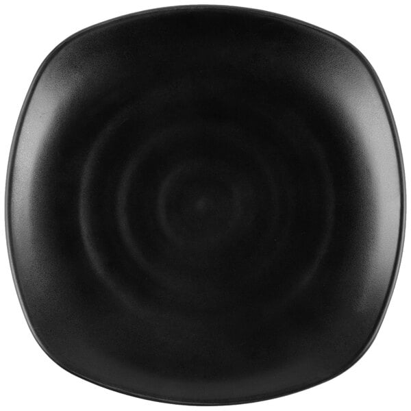 A black square melamine plate with a circular rim.