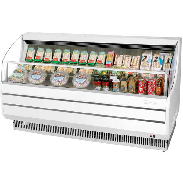 A white Turbo Air horizontal air curtain display case full of food.