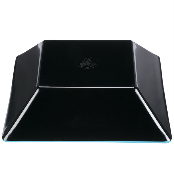 A black square melamine bowl with a blue border.