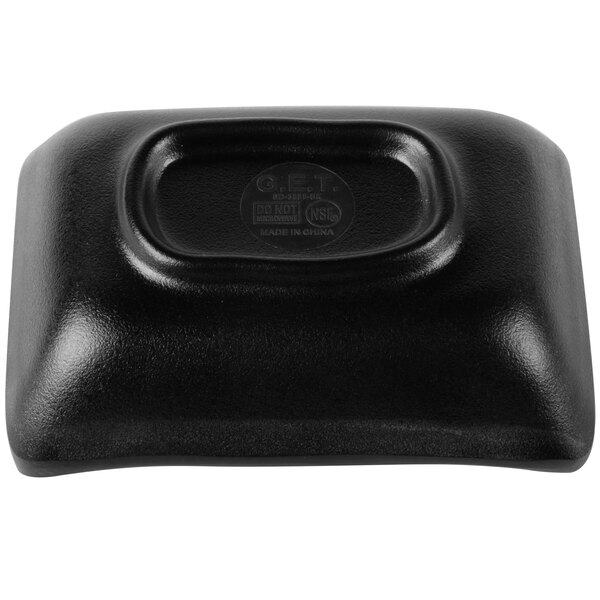 A black rectangular GET Nara melamine sauce dish.