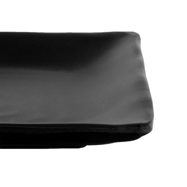 A black rectangular GET Nara melamine platter.
