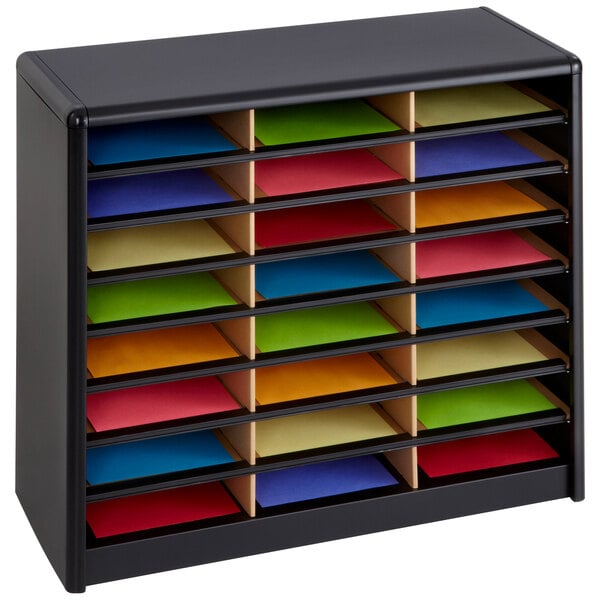 A black shelf with many colored papers in Safco 24 Compartment File Organizer.