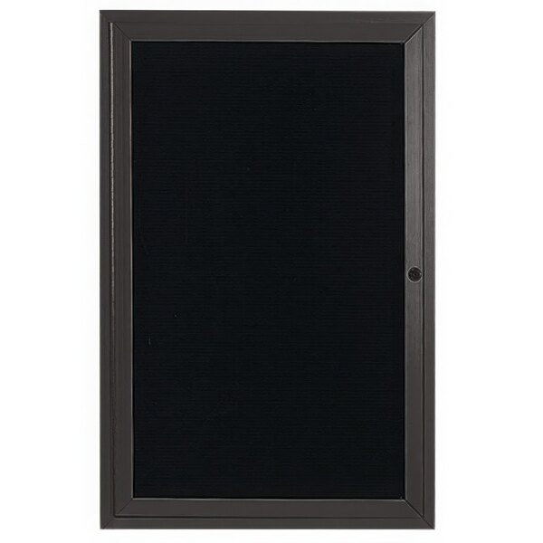 A bronze rectangular board with a black frame and a black board inside.