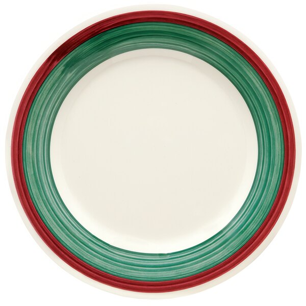 A white plate with a green rim.