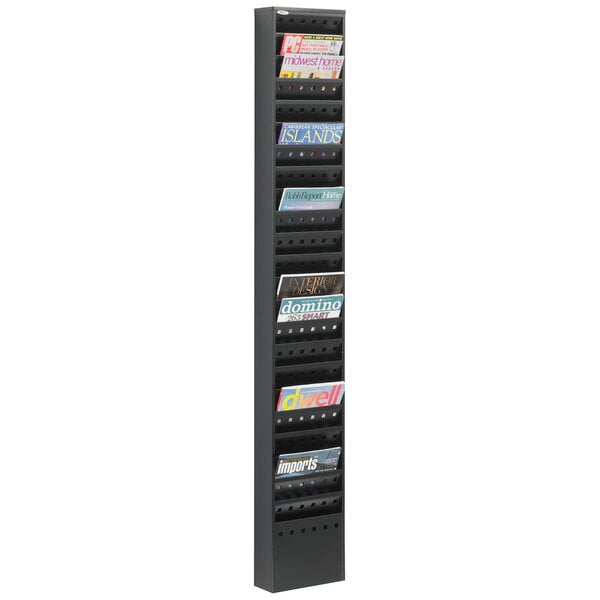 A black steel Safco magazine display rack with magazines on the shelves.