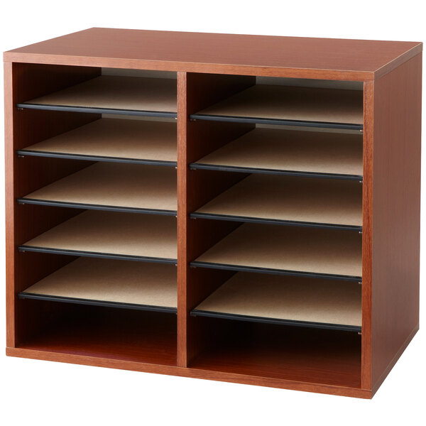 A cherry wood Safco file organizer on a wooden shelf with paper in it.