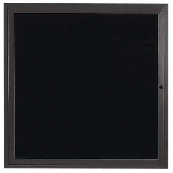 A black square frame with a white border.