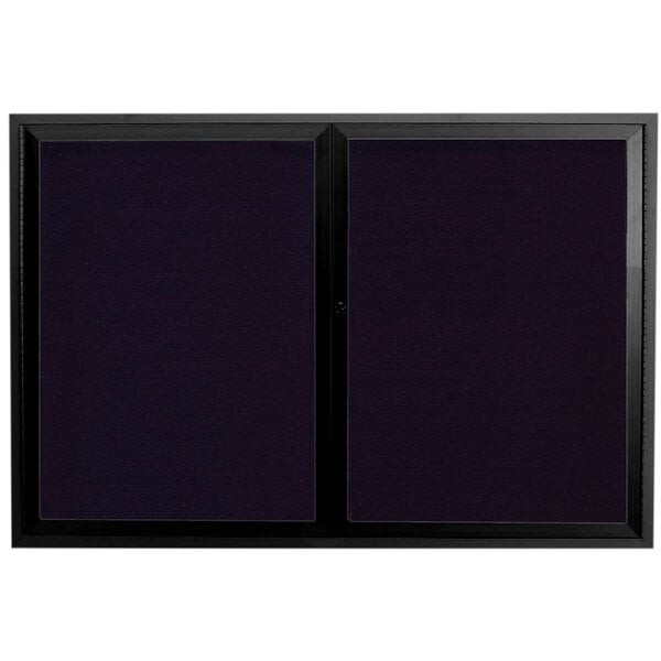 A black rectangular object with two black doors and a black border with black letters on a white background.