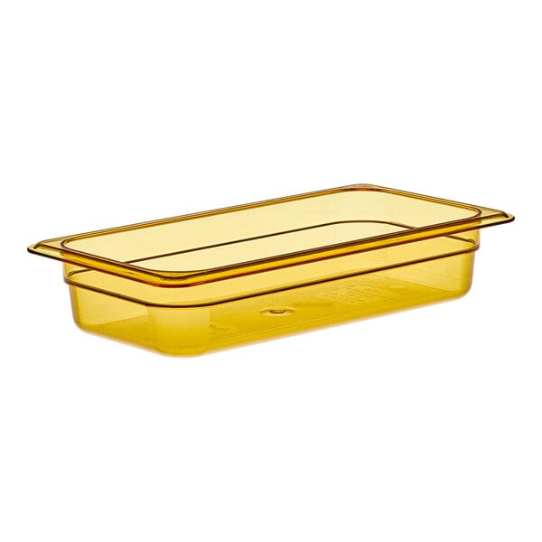 A yellow plastic container with a lid.