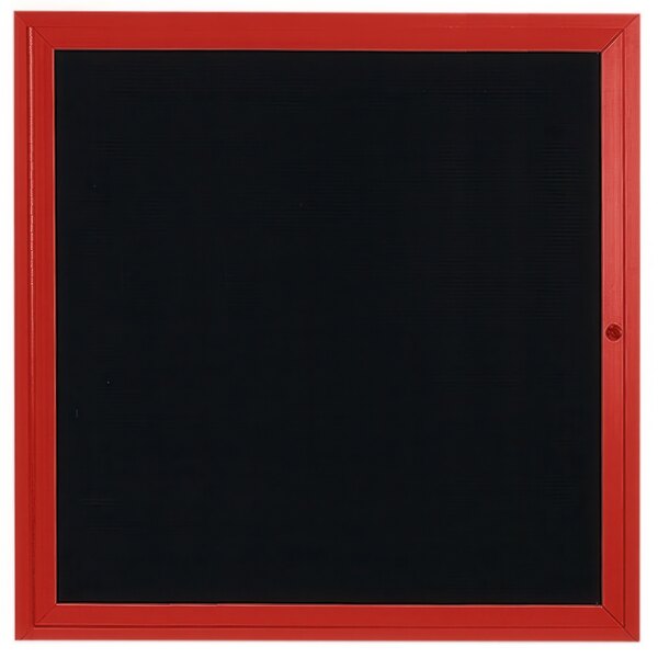 A black board with a red frame on a white background.