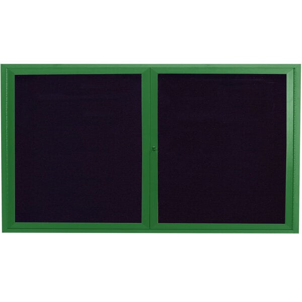 Two green aluminum enclosed bulletin boards with black trim.