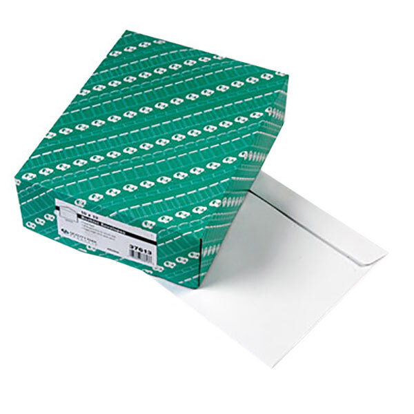 A green box with white text and designs, containing Quality Park white file envelopes.