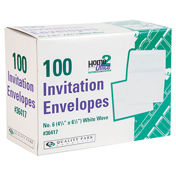 A white box of Quality Park white gummed seal envelopes with green and white text.
