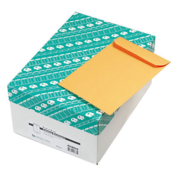 A white box with brown Kraft file envelopes inside.