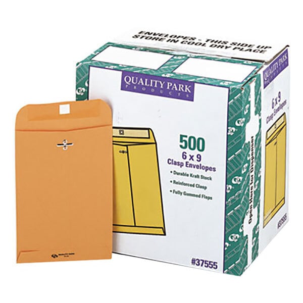 A box of 500 Quality Park brown Kraft file envelopes with a yellow sign.