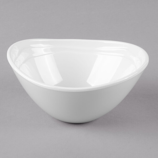 A close up of a GET Magnolia melamine bowl with a textured rim.