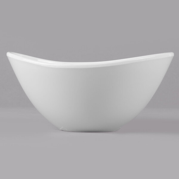A close-up of a white GET Magnolia melamine bowl with a textured rim.