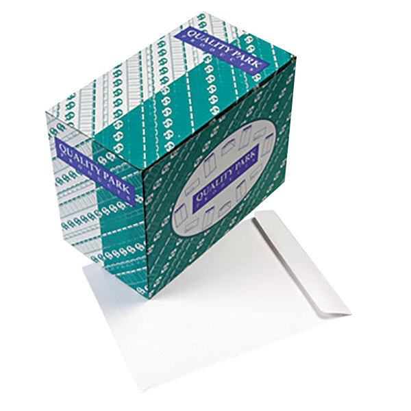 A box with a label for Quality Park white file envelopes.