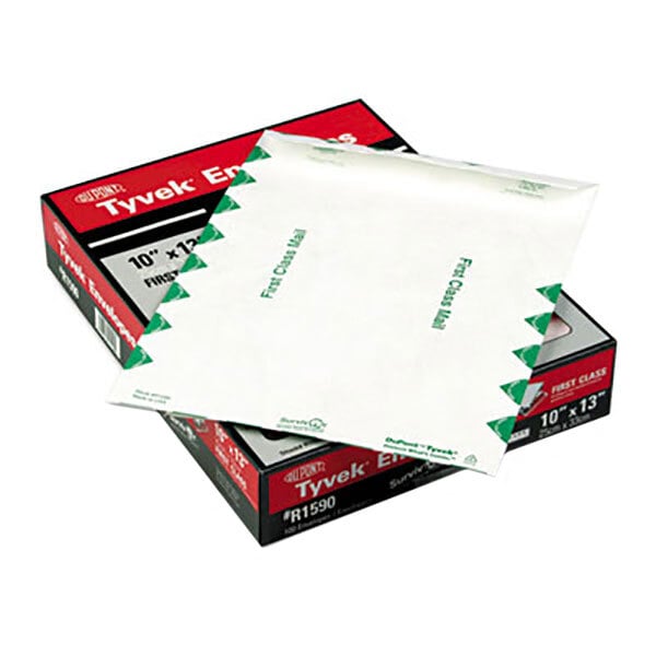A white envelope on a black box with the words "U.S. Postal Service First Class Mailer"