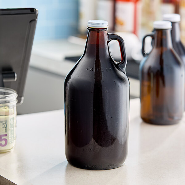 A Libbey amber growler on a counter.
