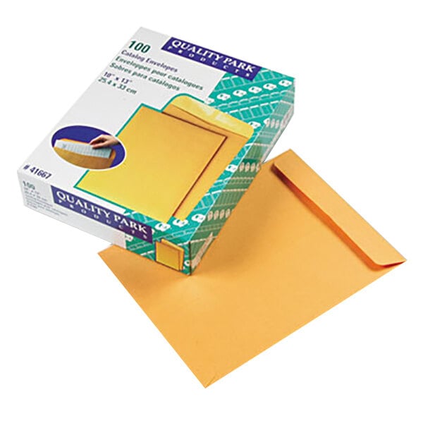 A box of Quality Park brown Kraft file envelopes with a yellow label.