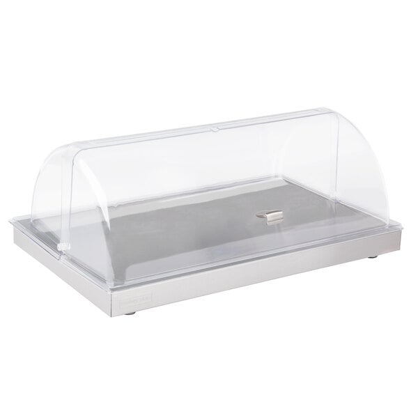 A clear plastic container with a clear lid on a Vollrath stainless steel cooling plate.
