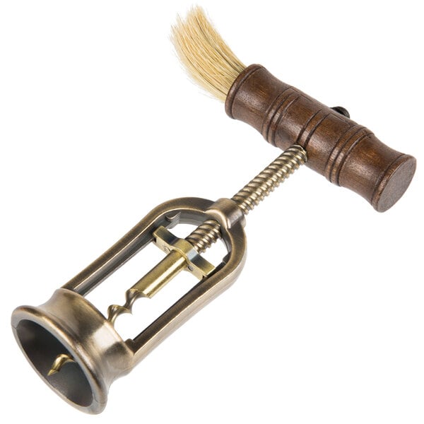 A Franmara metal and wood corkscrew with a brush.