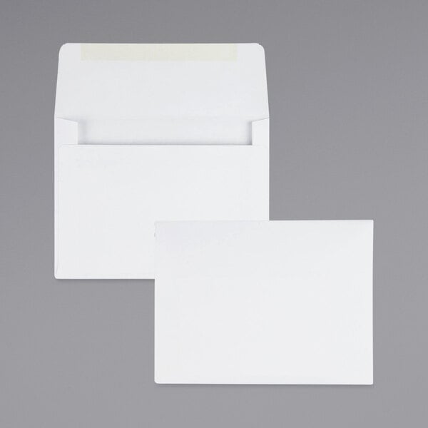 Two white Quality Park #5 1/2 envelopes.