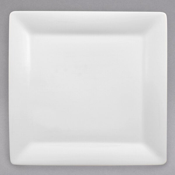 A white Villeroy & Boch square porcelain plate with a white rim.