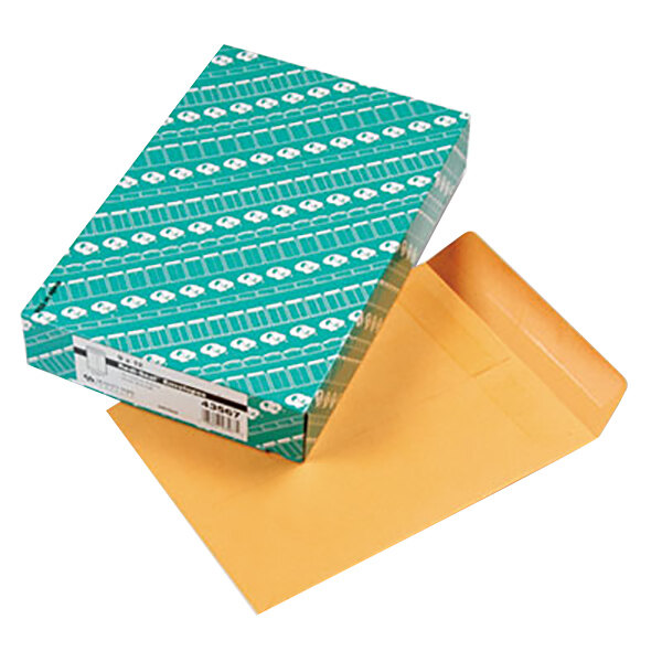 A white box of Quality Park brown kraft file envelopes with a white label.