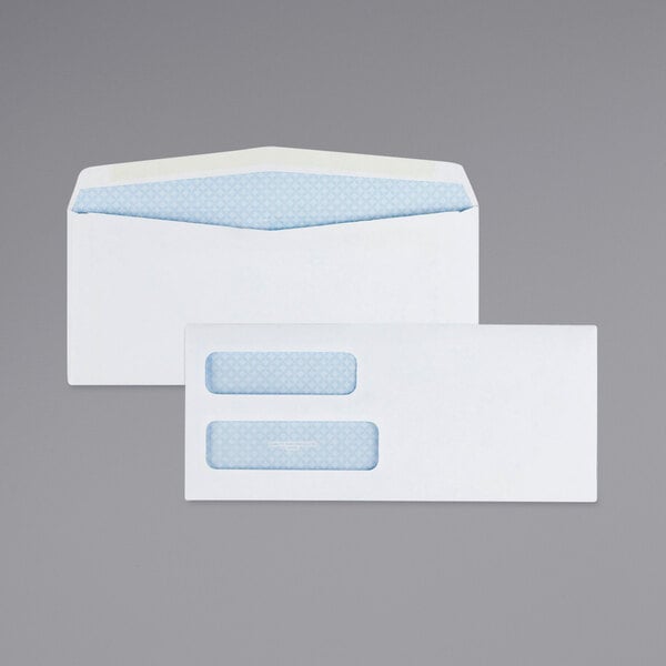 A white Quality Park envelope with blue rectangles and a window.