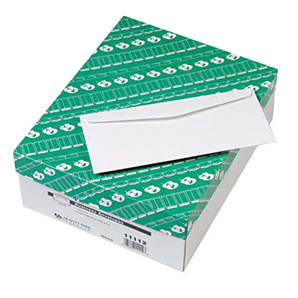 A box of Quality Park #10 white gummed seal business envelopes.