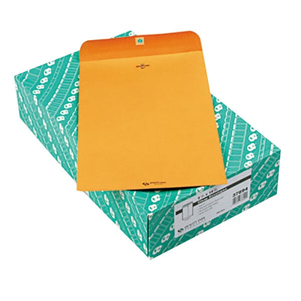 A box of brown Quality Park file envelopes with a yellow label.