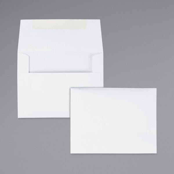 Two white Quality Park envelopes with a white piece of paper inside.