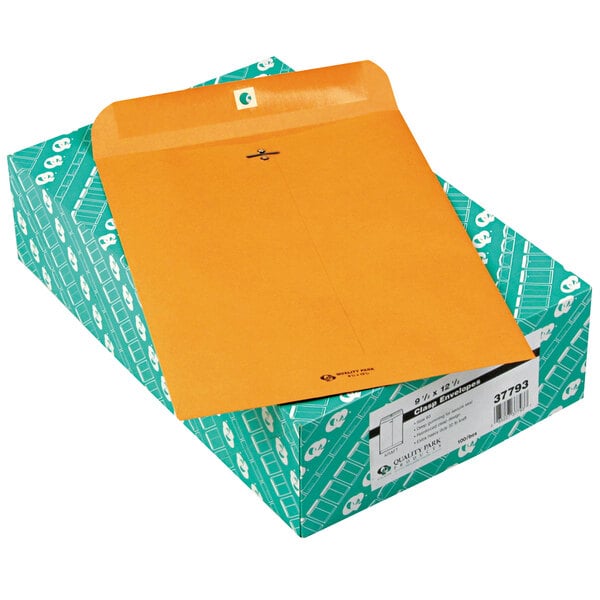 A green box with a yellow Quality Park #93 brown kraft file envelope on it.