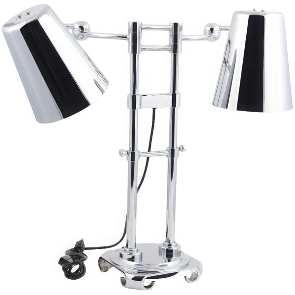 A chrome Bon Chef freestanding heat lamp with two bulbs.