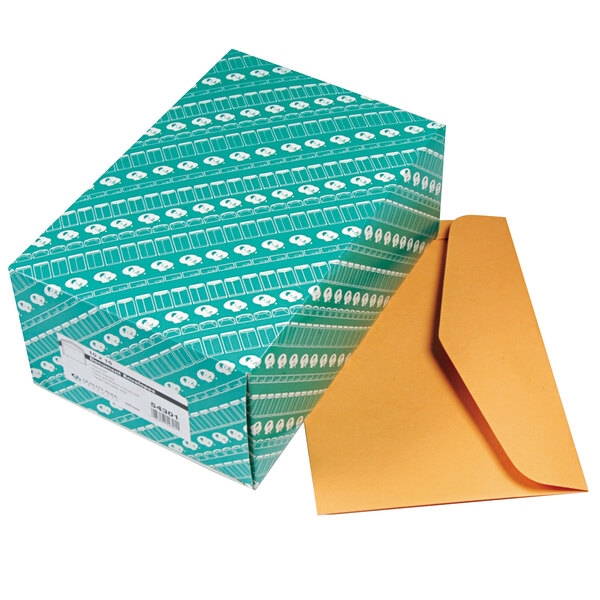 A green and white box of Quality Park brown Kraft file envelopes.