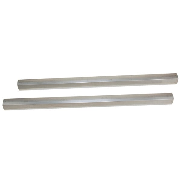 A pair of metal rods with a white rectangular object on a white background.