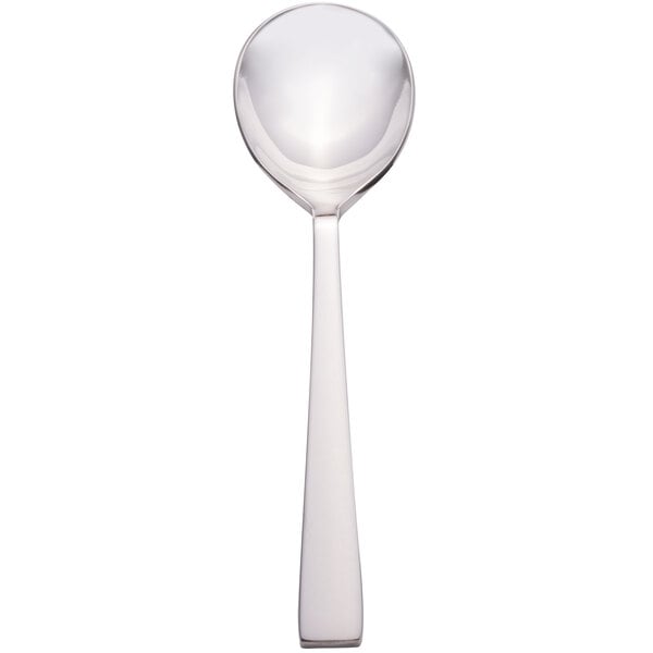 A silver Bon Chef rounded bowl soup spoon with a white handle.