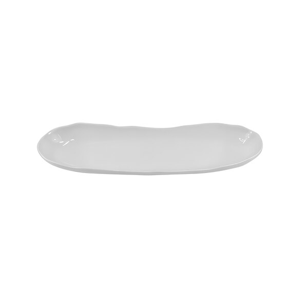 A white melamine tray with an uneven curved edge.