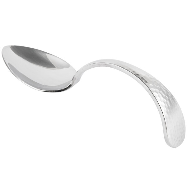 A close-up of a Bon Chef silver spoon with a textured, curved handle.