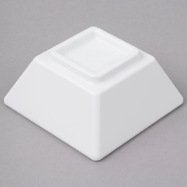 A white square Elite Global Solutions melamine ramekin.