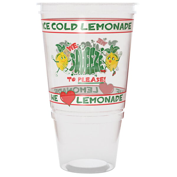 A clear plastic "We Squeeze to Please" lemonade cup with a lid and logo on the counter filled with cold lemonade.