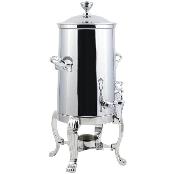 A stainless steel Bon Chef coffee chafer urn with chrome trim on a stand.